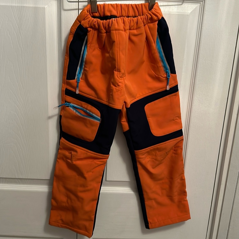 Like new orange/blue elastic waistband snow pants no stains fits SIZES 5-7/med